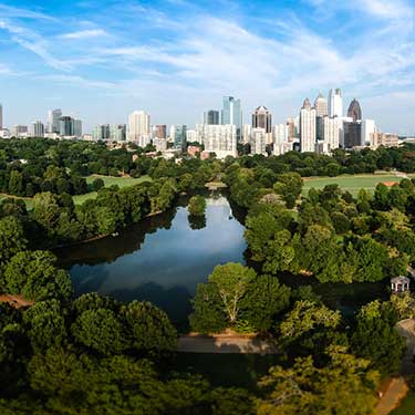 Freight Shipping from Georgia to California - Skyline behind trees and water