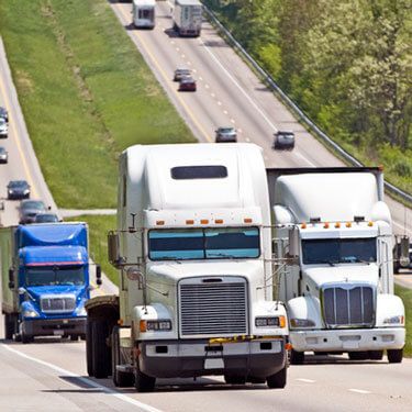 Freight Shipping from Georgia to Texas - Three trucks on highway