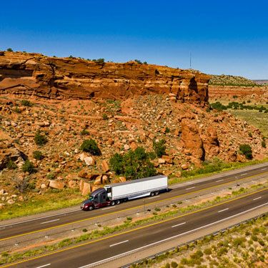 Freight Shipping from Texas to California - Truck by cliffside