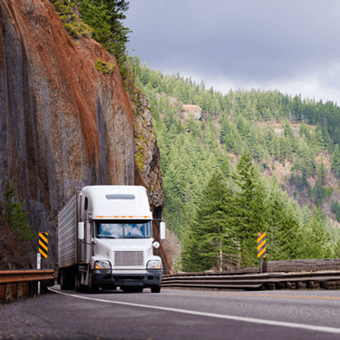 Freight Shipping from New York to California - Truck by cliffside