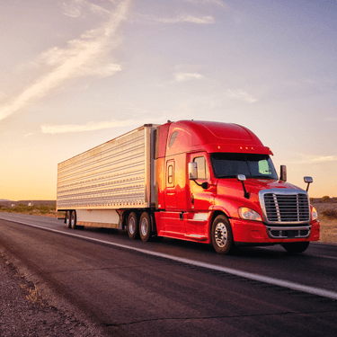 Freight Shipping from New York to Texas - Red truck on road