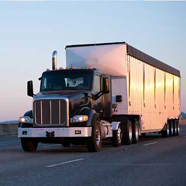 Freight Shipping from Pennsylvania to Texas - Truck on road with clear sky