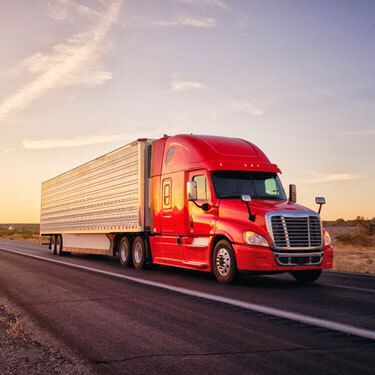 Shipping from Washington to Texas - Red truck on road