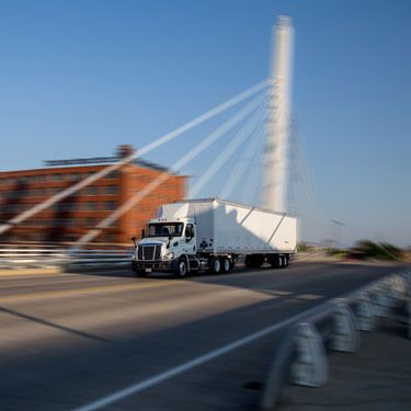 Freight Shipping from Wisconsin to New York - White freight truck on suspension bridge