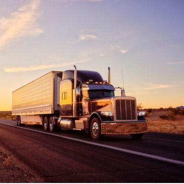 Freight Shipping from Wisconsin to Texas - Long haul semi-truck on a rural highway