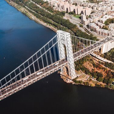 freight shipping from-Iowa to New York - aerial view of suspension bridge