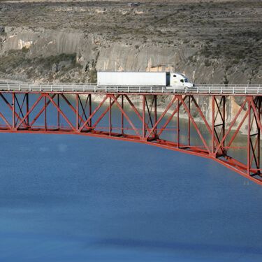 freight shipping from Iowa to Texas - truck crossing bridge