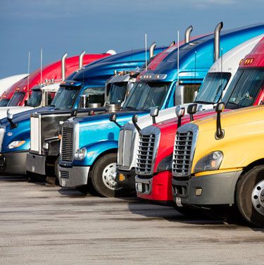 freight shipping from Kansas to Missouri - trucks lined up in parking lot