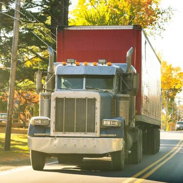 Shipping Freight from Maine to California - Red Blue semi truck