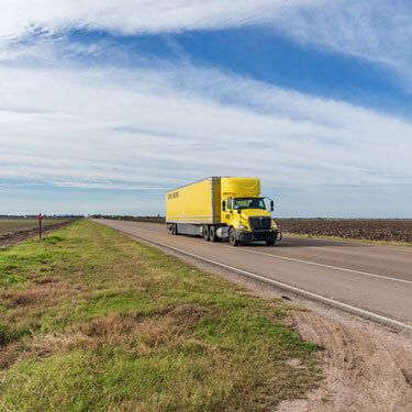 Freight Shipping from Arkansas to Texas - freight traveling down highway