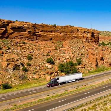 Freight Shipping from California to Arizona - Freight Truck Traveling on Highway