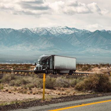 Shipping freight from Texas - featuring a Semi Truck traveling on the highway