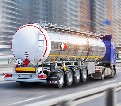 hazmat tractor trailer transporting hazardous material in city