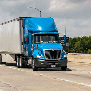 Freight Shipping from Alabama to Texas - truckload traveling on highway