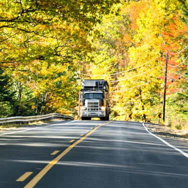 Shipping Freight from Maine - Semi Truck Traveling on Highway