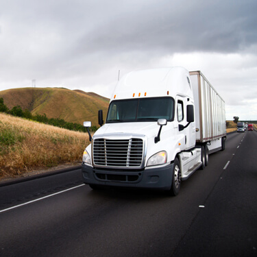 Shipping Freight from Maine - Semi Truck Traveling on Highway