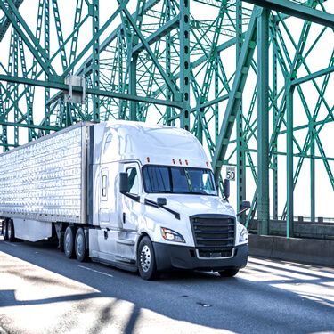 Shipping Freight from New York - Freight Truck traveling on bridge