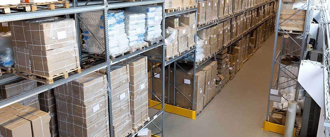 Boxes stacked on shelves inside of a fulfillment warehouse