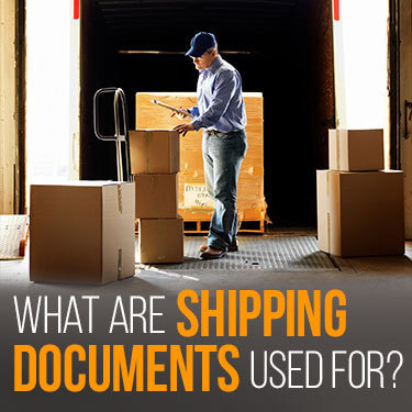 Warehouse worker loading packages into a trailer