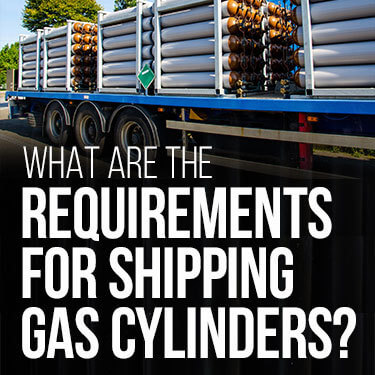 Flatbed trailer shipping compressed gas cylinders