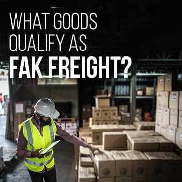 Overseer in a face mask and safety helmet inspecting boxes in a warehouse