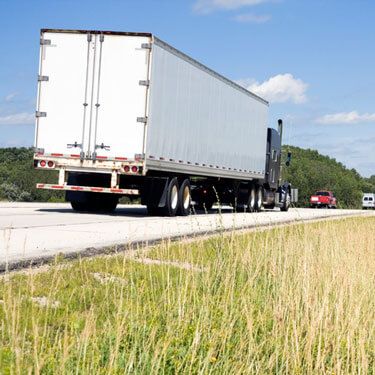 Freight Shipping from Wisconsin to Florida - Rear view of freight truck on highway