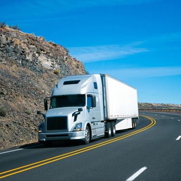 Shipping Freight From Maine to Florida - Gray semi-truckload on highway