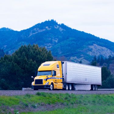 Freight Shipping from North Carolina to California - Yellow big rig semi truck